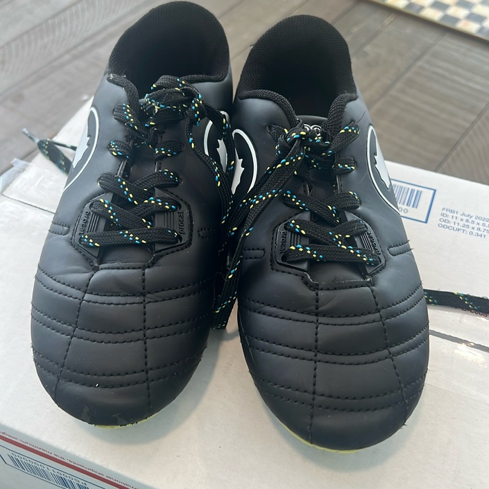 Pro cat cleats by puma, size 13